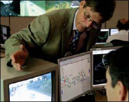 Image showing members of staff monitoring the network traffic